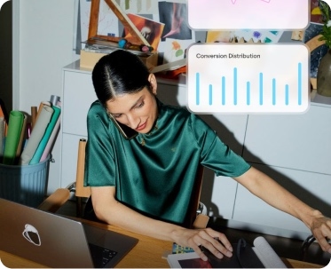 A clinic coordinator on the phone at her desk, a conversion chart floating beside her.