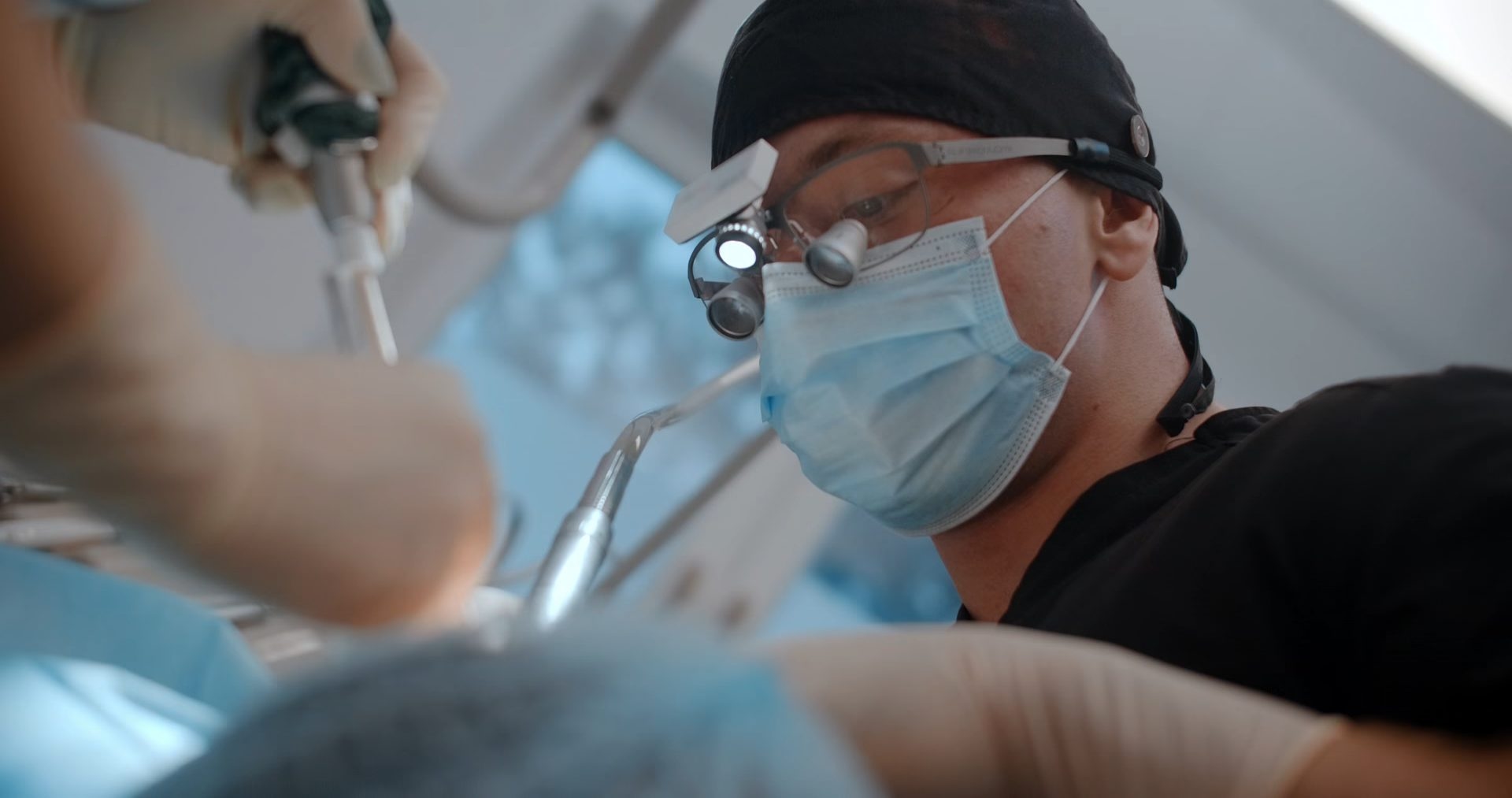 A close portrait of a patient's eye during an examination.